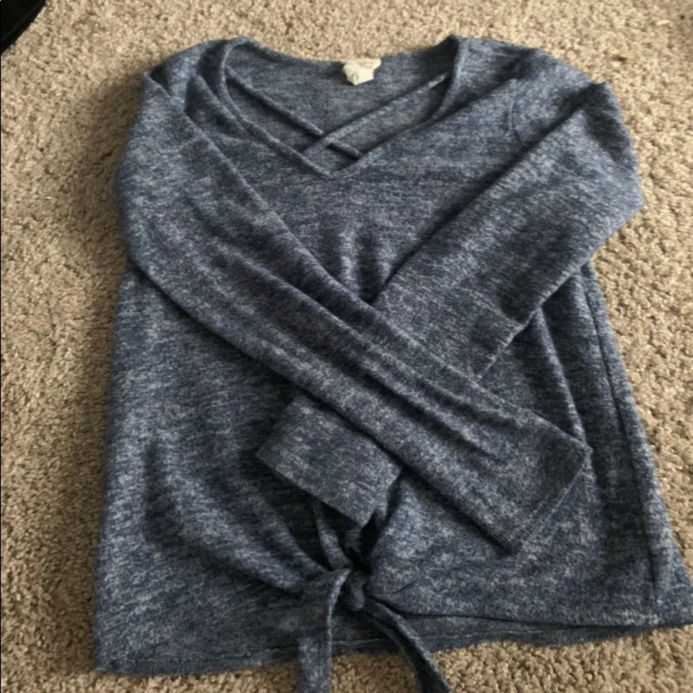 Blue and white sweater with tie at bottom